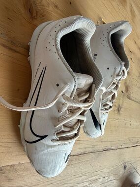 Nike White Cleats with Black Swoosh Accents